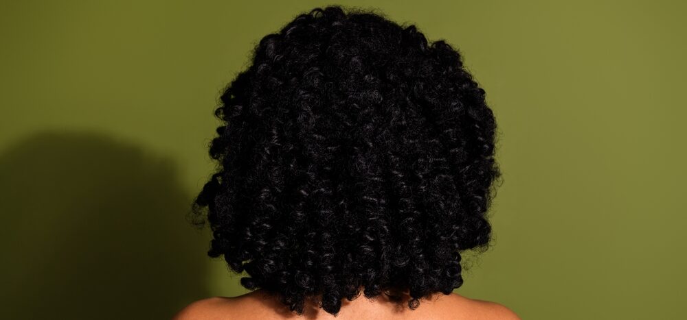 Tightly curled hair texture showing human variation and what Adam and Eve may have looked like.