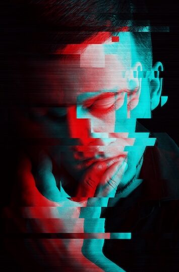 A man appears thoughtful, holding his chin. The image has a glitch effect with red and blue tones.