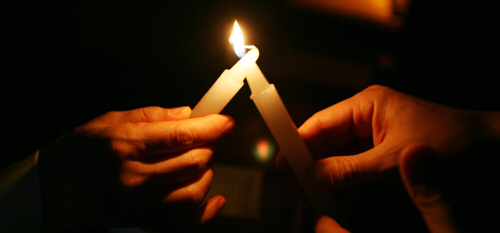 sharing fire to light candle and keep hope alive