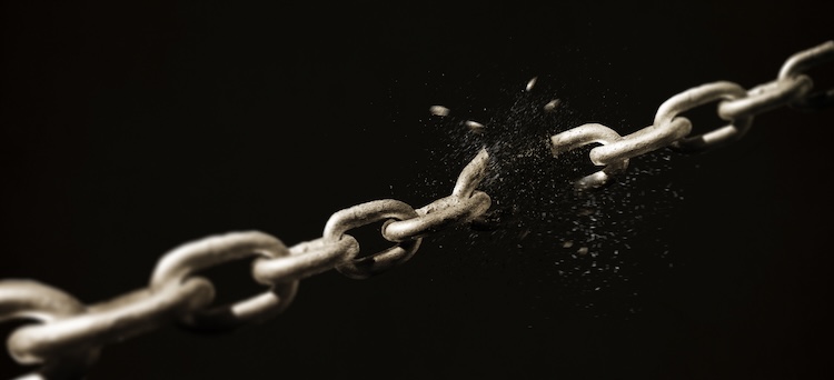 A heavy chain snapping apart, symbolizing Jesus breaking the chains of sin.