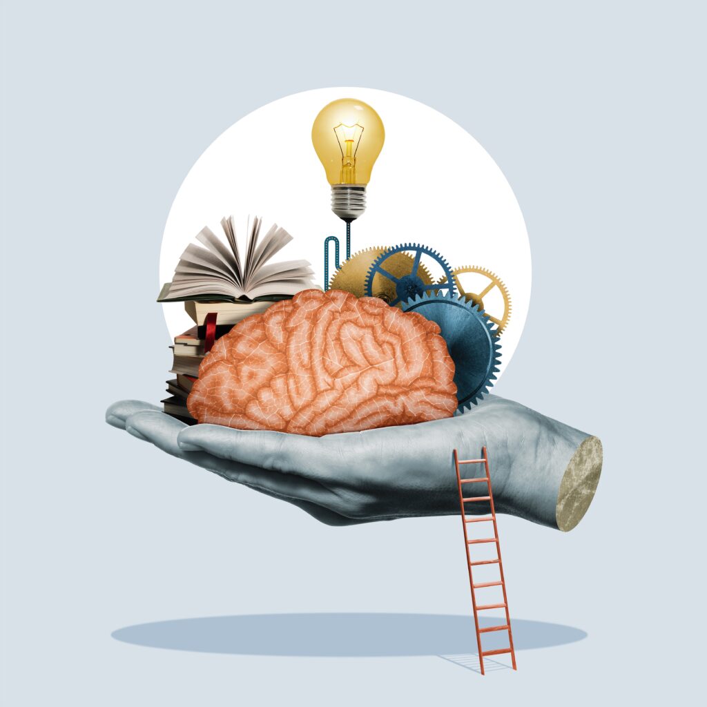 A surreal image of an open hand holding a brain surrounded by books, gears, and a light bulb, symbolizing knowledge and creativity. A small ladder leans against the hand.