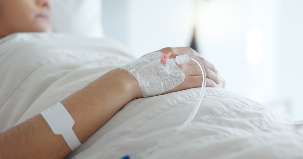 Hospital patient receiving treatment symbolizing hope for miracles and healing.