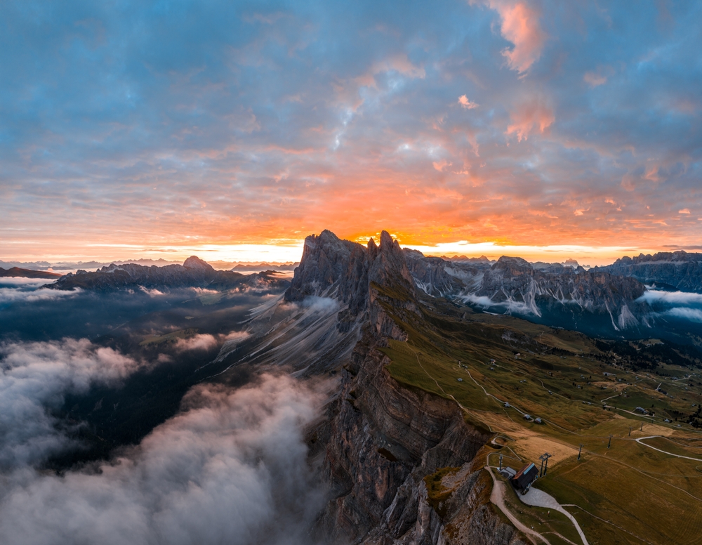 A breathtaking aerial view of mountains at sunset - representing how creation points to the existence of God.