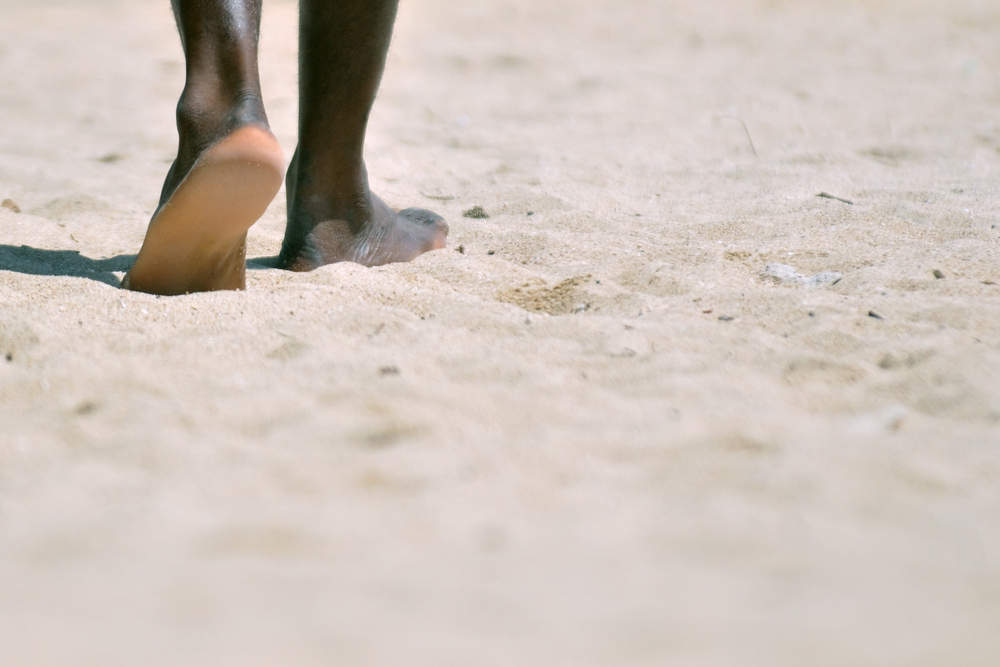 Feet walking on sand that could have been like the feet of Adam or Eve