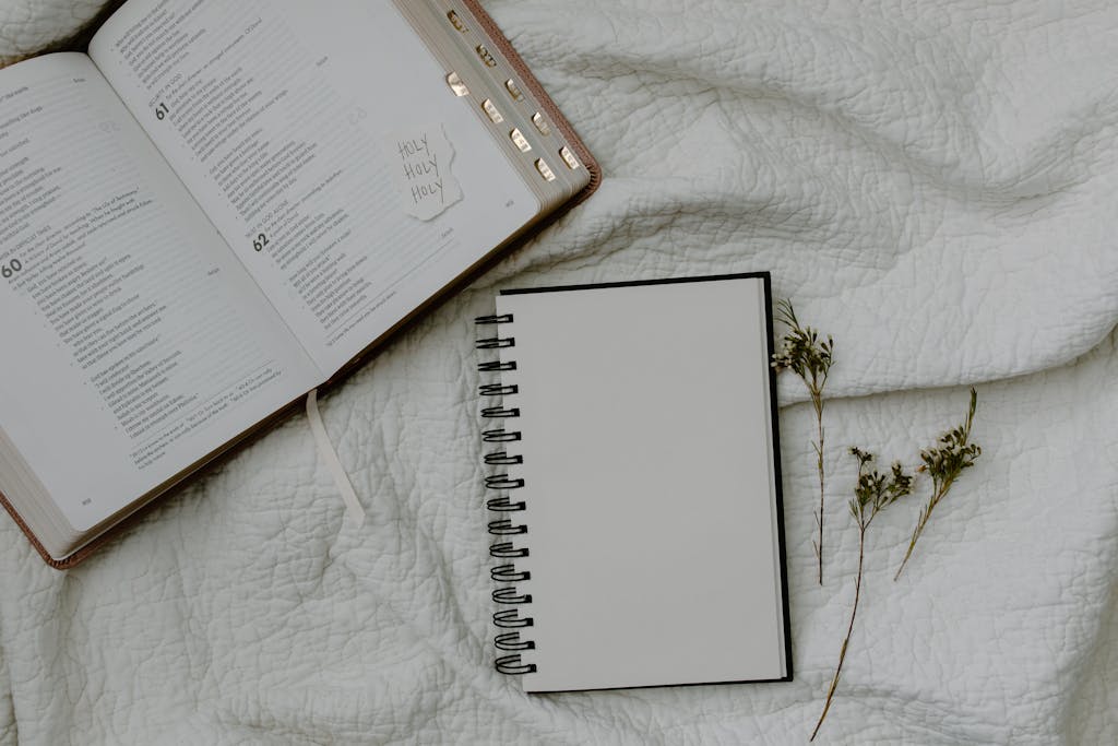 Open Bible with visible chapters and verses connected to the question “is the Bible true.”